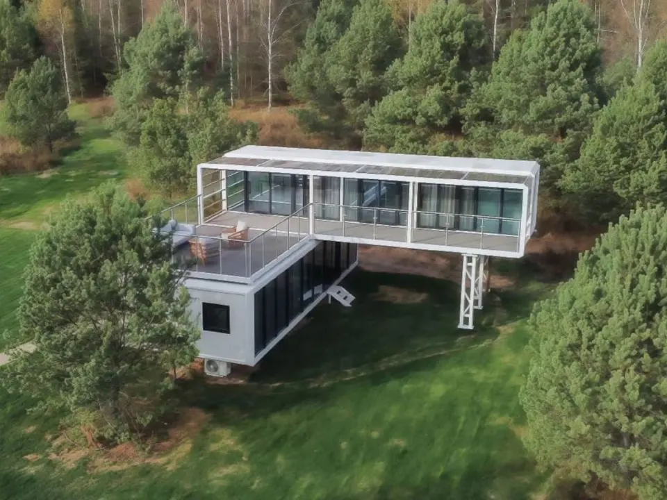 Two storey Apple Cabin among pine trees