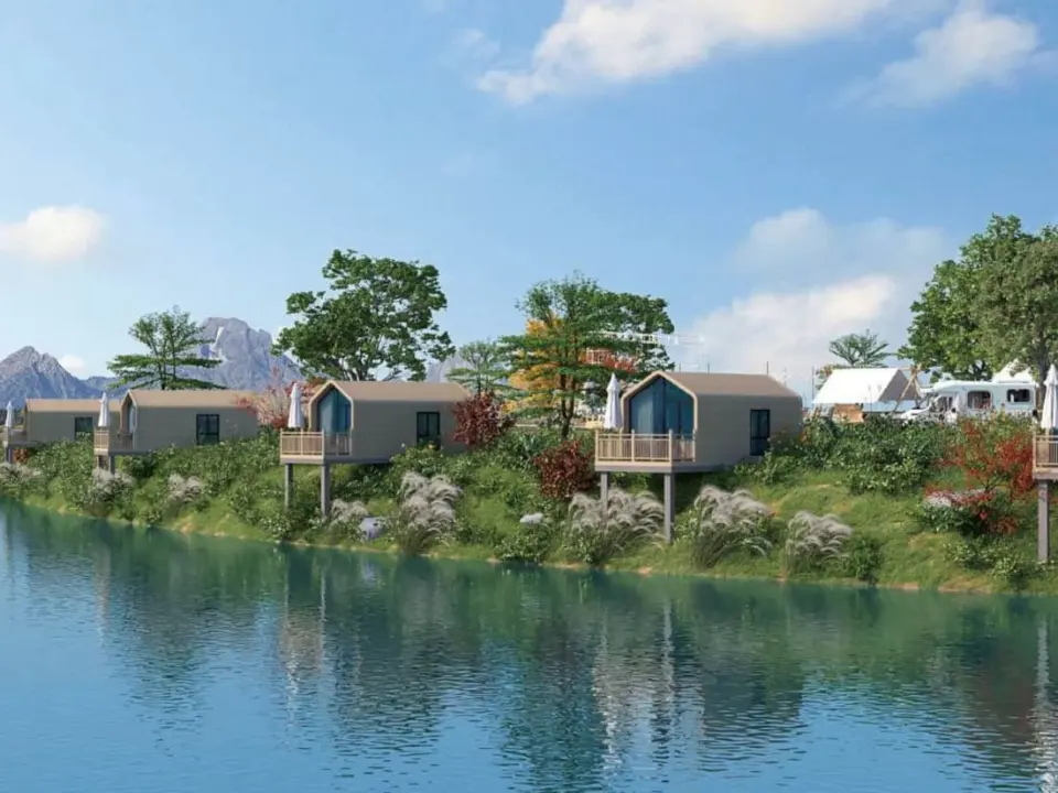 Natural House cabins on a lakeshore